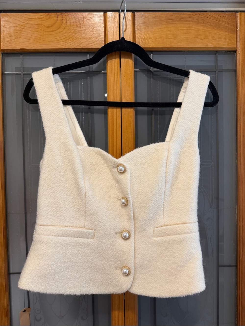 Reformation Cream Pearl-Button Strapless Textured Top